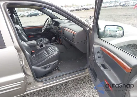 1999 Jeep Grand Cherokee Limited из США, поврежденный, VIN 1J4GW68N1XC654864